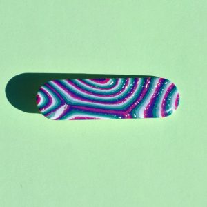 Barrette rectangle arrondi, au motif "à la dérive des astres".