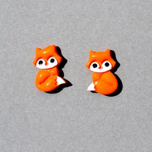Petite puce renard orange et blanc.